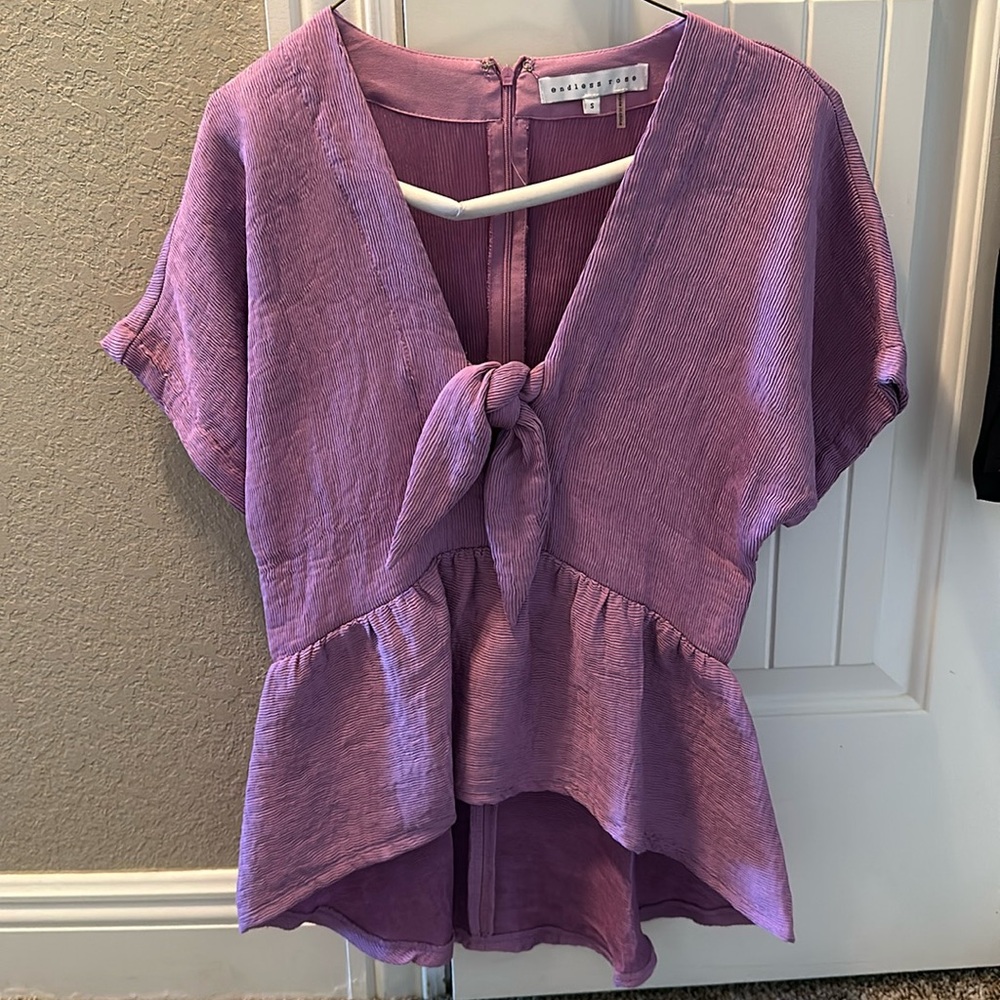 Purple peplum hi-lo blouse